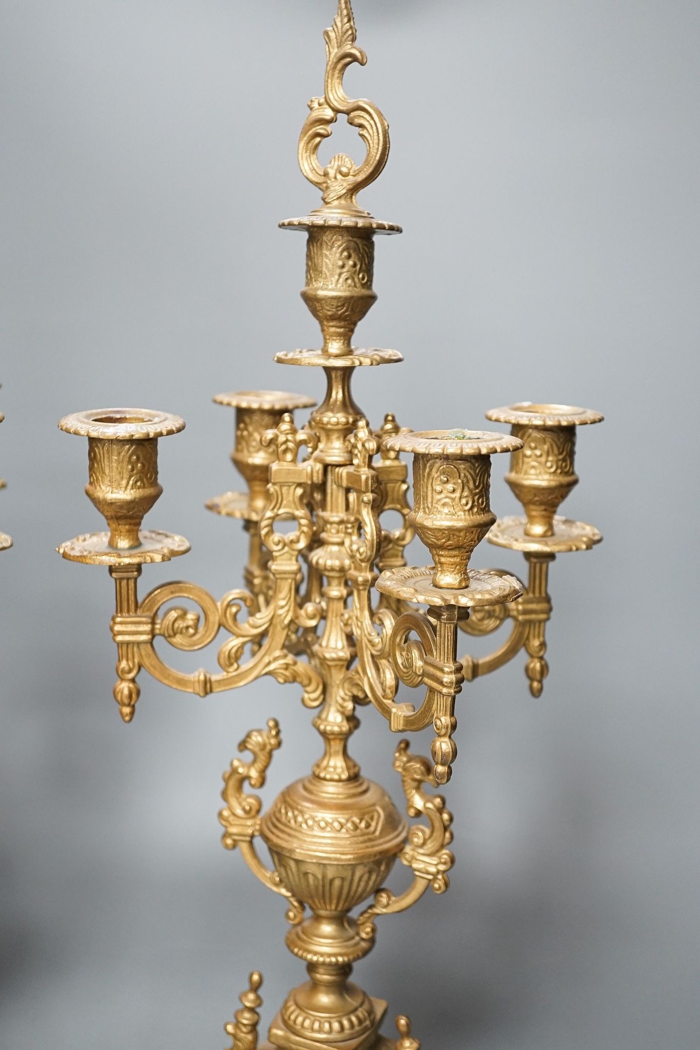 A large pair of ornate baroque style gilt-brass candelabra, 51cm